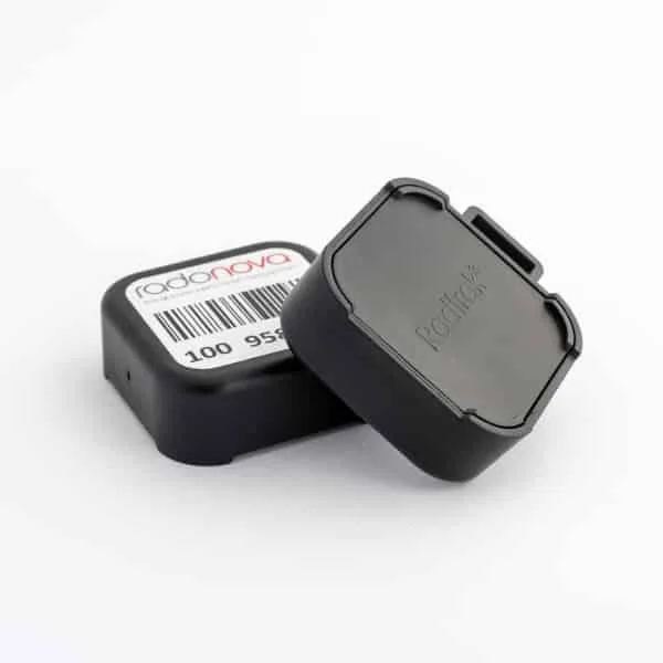Radonova Radtrak3 long-term radon detector, a small black alpha track detector